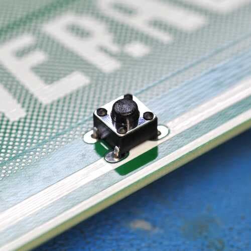 Badge assembly: button in